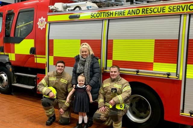 Hollie and her mum Siobhan Mullen were invited to meet local fire fighters to celebrate her bravery.
