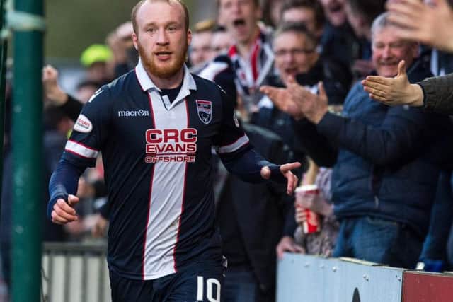 Liam Boyce celebrating a goal for Ross County.