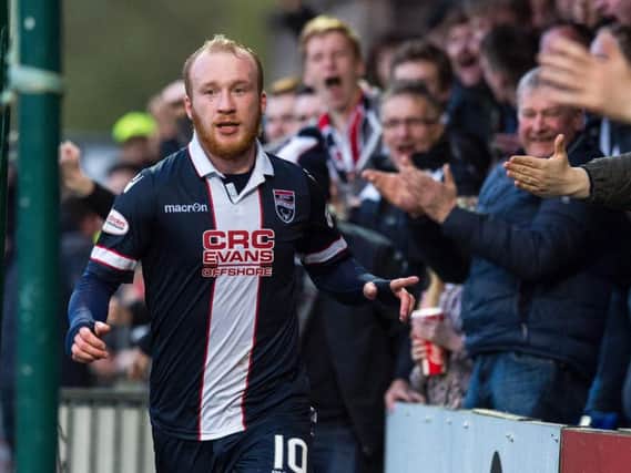 Liam Boyce celebrating a goal for Ross County.