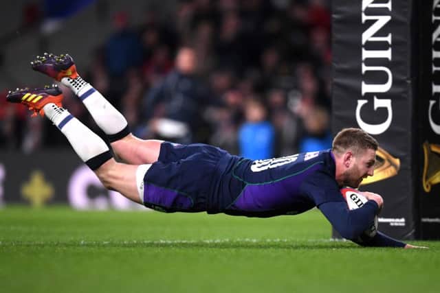 Finn Russell, scoring at Twickenham in last year's Six Nations, will not be involved in Scotland's opener this year in Ireland. Picture: Laurence Griffiths/Getty Images