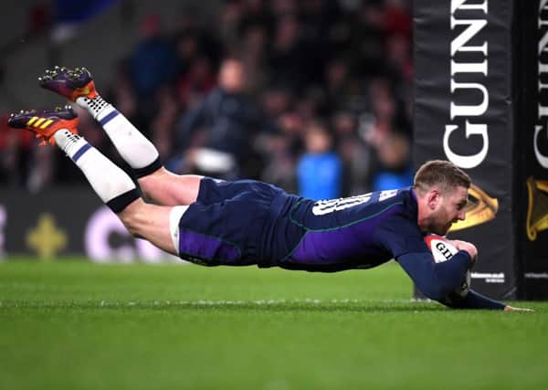 Finn Russell, scoring at Twickenham in last year's Six Nations, will not be involved in Scotland's opener this year in Ireland. Picture: Laurence Griffiths/Getty Images