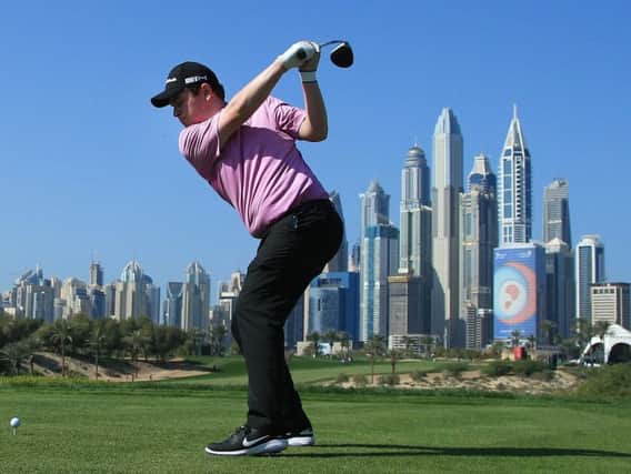 Scottish No 1 Bob MacIntyre tees off on the eighth on the Majlis Course at Emirates Golf Club on his way to a five-under-par 67 in the third round of the Omega Dubai Desert Classic