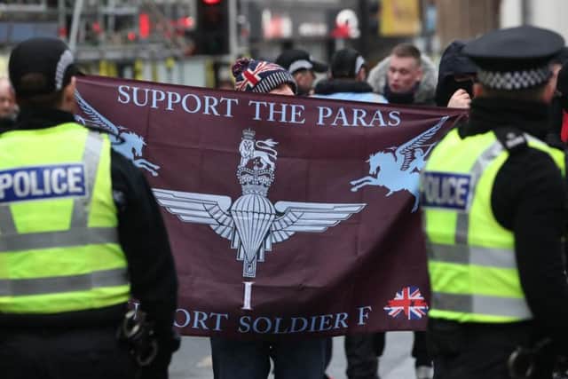 A supporter of Soldier F protests at the West of Scotland Band Alliance March for Justice in Glasgow   picture: PA