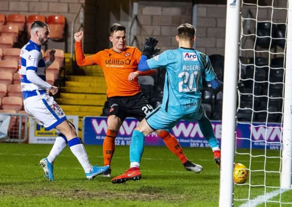 Dundee United's Lawrence Shankland scores to make it 1-1 against Morton. Picture: Ross Parker / SNS