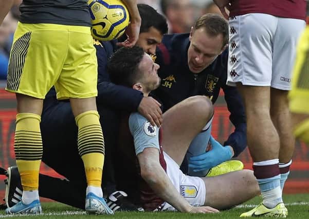 Aston Villa's John McGinn suffered an ankle fracture. Picture: Adrian Dennis/AFP