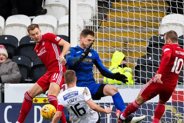 St Mirrens Sam Foley gets in the way of an Aberdeen chance created by Ryan Hedges and Niall McGinn
