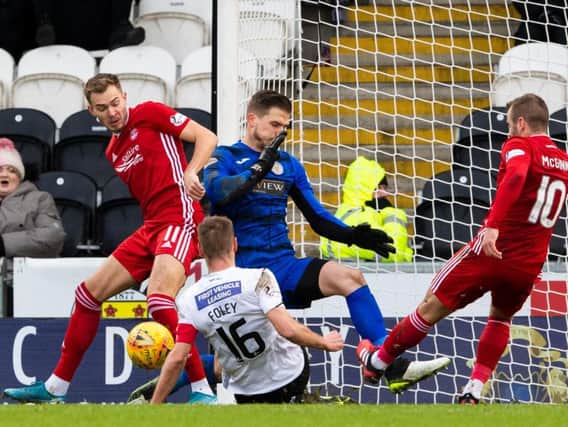 St Mirrens Sam Foley gets in the way of an Aberdeen chance created by Ryan Hedges and Niall McGinn