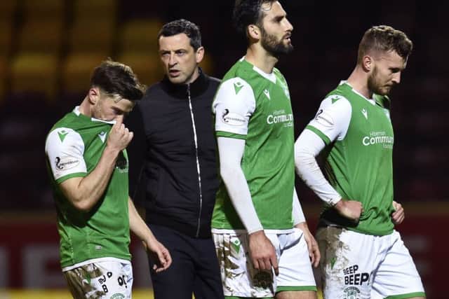 Adam Jackson, third left, walks off with teammates Lewis Stevenson and Tom James after drawing 0-0 against Motherwell.