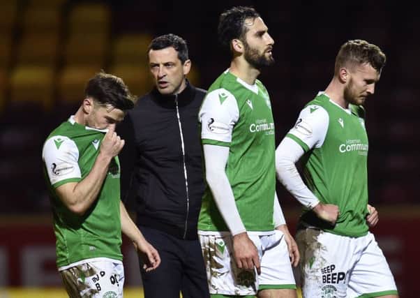 Adam Jackson, third left, walks off with teammates Lewis Stevenson and Tom James after drawing 0-0 against Motherwell.