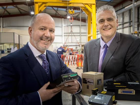 Albacom CEO Jim Davidson and Ken Clarke, business development manager. Picture: Contributed