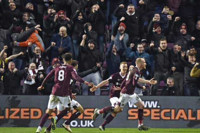 Tynecastle erupts as Liam Boyce celebrates his late winner against Rangers. Picture: Rob Casey/SNS