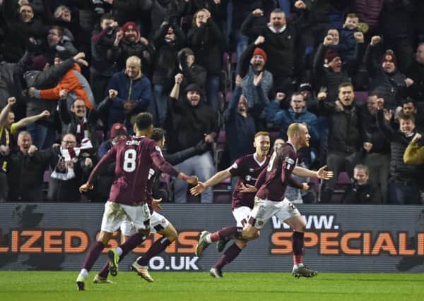Tynecastle erupts as Liam Boyce celebrates his late winner against Rangers. Picture: Rob Casey/SNS