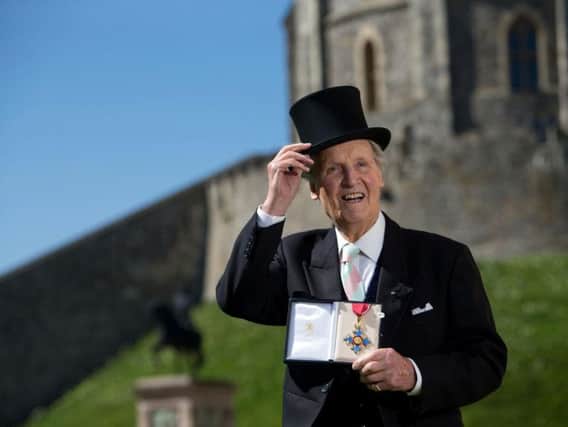 Nicholas Parsons with his CBE, given to him by the Queen in 2014.