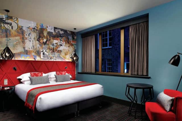 Rooms at the Malmaison Edinburgh City, where dark tones and bold colours make for an intimate feel