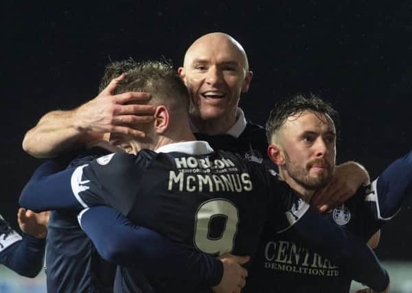 Conor Sammon celebrates with his teammates after making it 2-0 to Falkirk. Picture: Mark Scates / SNS