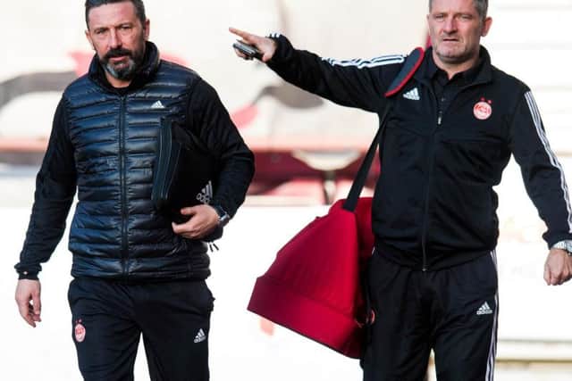Tony Docherty has backed Derek McInnes after the Aberdeen boss was targeted by boo-boys at the Dons' 0-0 draw with St Mirren
