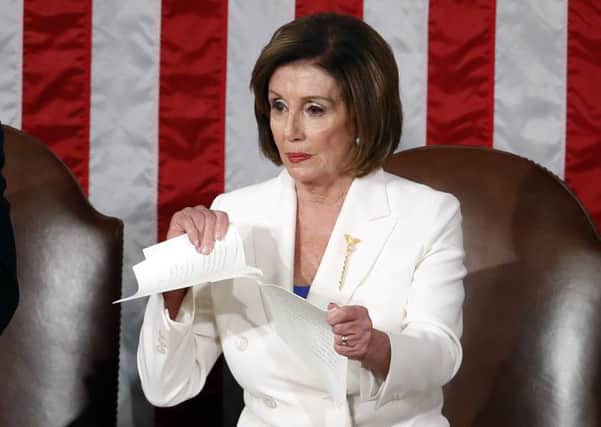House Speaker Nancy Pelosi tears up her copy of Donald Trump's State of the Union address after his speech to a joint session of Congress (Picture: Alex Brandon/AP)