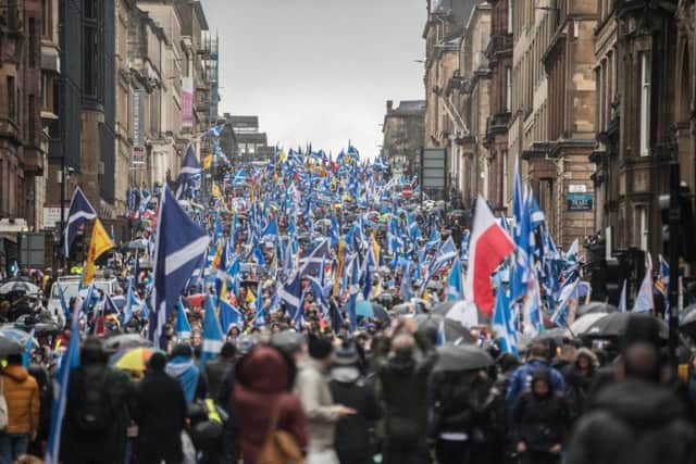 Pro-independence campaigners march through Glasgow in support of an IndyRef2. Picture: John Devlin