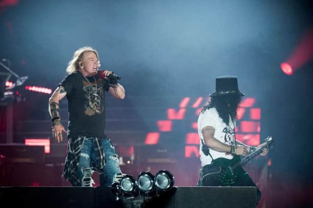 Old school rockers Guns 'N Roses will play Glasgow Green this summer as well. Picture: AFP / Scanpix Denmark / Mads Joakim Rimer Rasmussen