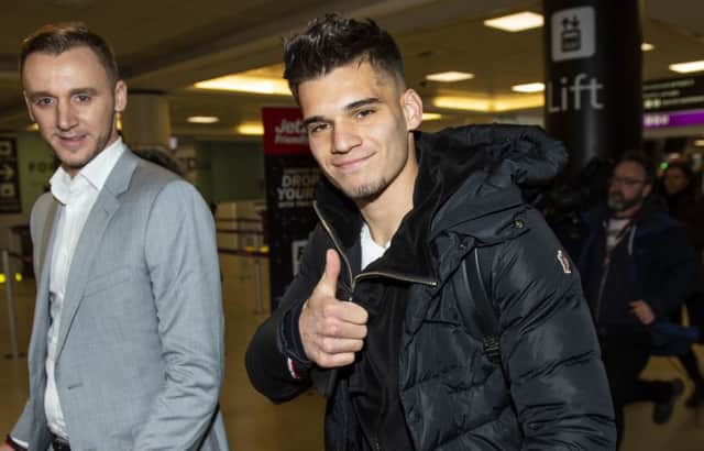 Genk and Romania Forward Ianis Hagi arrives at Edinburgh Airport ahead of a proposed move to Rangers. Picture: SNS Group