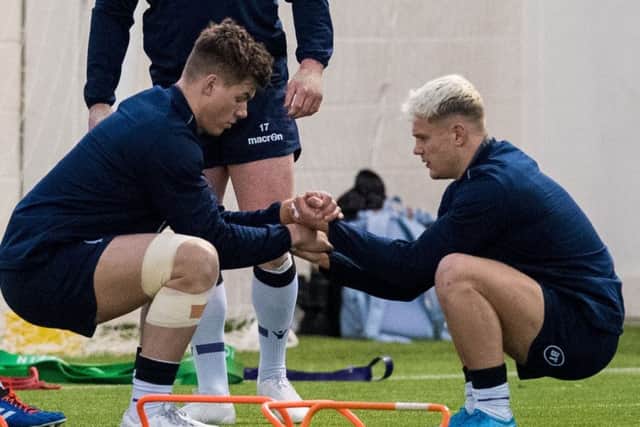 Huw Jones, left, and Darcy Graham train together in the build-up to the Six Nations. Picture: SNS/SRU.