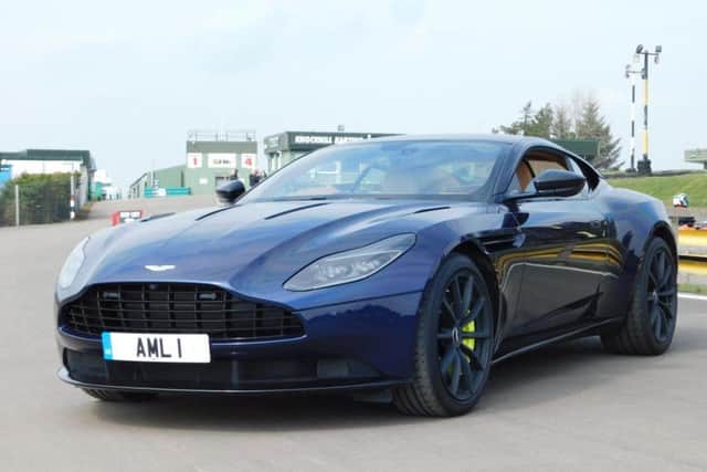 The British car manufacturer is famous for its luxury sports cars and supercars such as this DB11 AMR model. Picture: Scott Reid