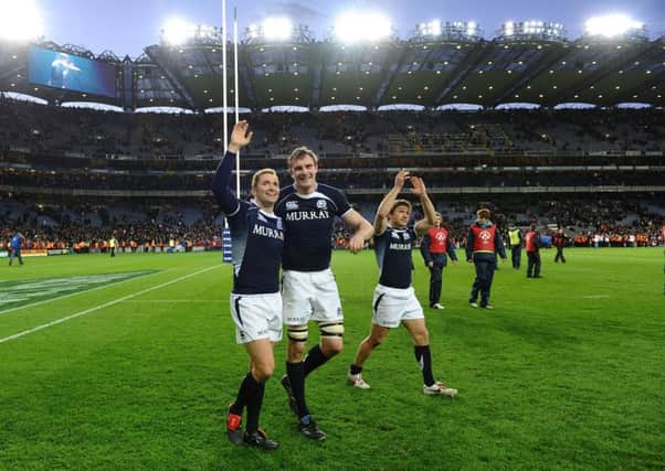 Dan Parks, Al Kellock and Chris Cusiter delebrate victory over Ireland at Croke Park in 2010. Picture: Getty.