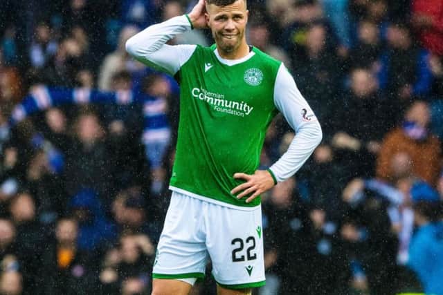 Florian Kamberi in action for Hibernian at Ibrox.