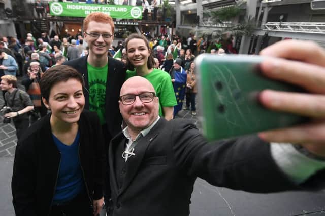 Patrick Harvie takes a selfie with supporters at the Brexit day launch of the Greens' campaign for Scotland to re-join the EU in Glasgow's The Barras. Picture: John Devlin
