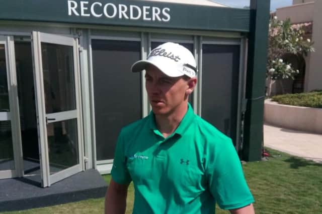 Grant Forrest talks to reporters after carding a four--under-par 66 in the  third round of the Saudi International at Royal Greens Golf Club in King Abdullah City
