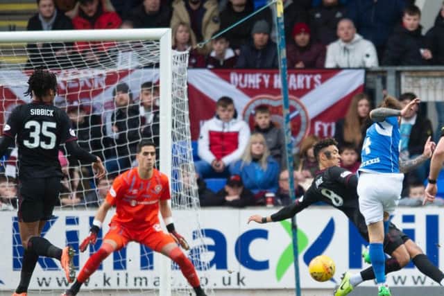 Stevie May puts St Johnstone ahead.