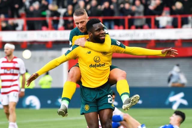 Two-goal hero Odsonne Edouard celebrates with Leigh Griffiths