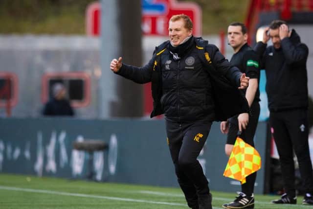 Neil Lennon celebrates Odsonne Edouard's second, and Celtic's third goal against Hamilton