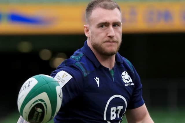 Stuart Hogg wears his heart on his sleeve but his protest will not have endeared him to the referee. Picture: PA.