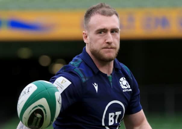 Stuart Hogg wears his heart on his sleeve but his protest will not have endeared him to the referee. Picture: PA.