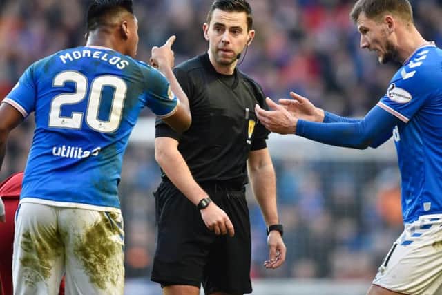 Alfredo Morelos has words with referee Andrew Dallas during Rangers' 0-0 draw with Aberdeen