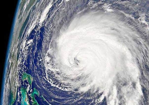 Water temperature is a key factor in the formation of hurricanes (Picture: Nasa/AP)