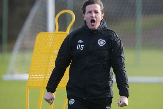Daniel Stendel roars instructions at training yesterday, having heard the Hearts following roar their approval in Perth on Saturday. Picture: SNS.