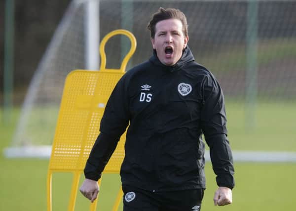 Daniel Stendel roars instructions at training yesterday, having heard the Hearts following roar their approval in Perth on Saturday. Picture: SNS.