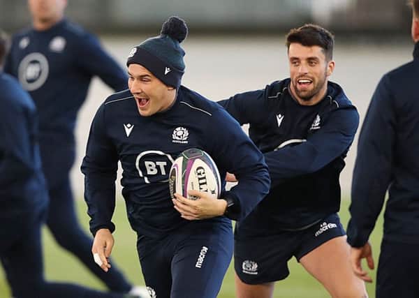 Scotland centre Sam Johnson gets away from stand-off Adam Hastings during a training drill as Scotland begin their preparations for the Calcutta Cup. Picture: Ian MacNicol/Getty