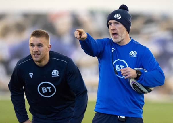 Scotland coach Steve Tandy gives centre Chris Harris some instructions ahead of this weekend's Calcutta Cup clash at Murrayfield. Picture: Alan Harvey/SNS