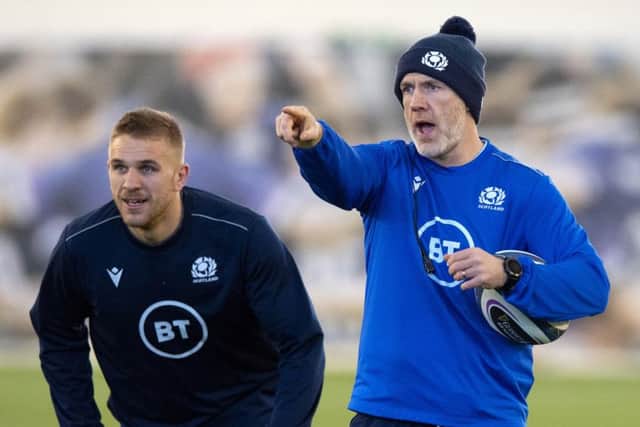 Scotland coach Steve Tandy gives centre Chris Harris some instructions ahead of this weekend's Calcutta Cup clash at Murrayfield. Picture: Alan Harvey/SNS