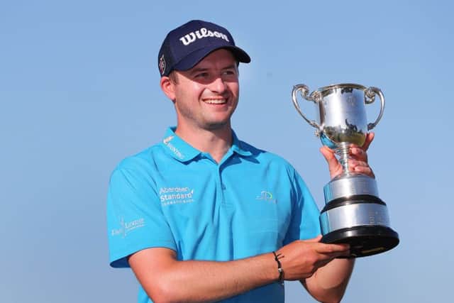 David Law, with the ISPS Handa Vic Open trophy he won last year, hopes this week in Australia will be fun after the Desert Swing. Picture: Getty