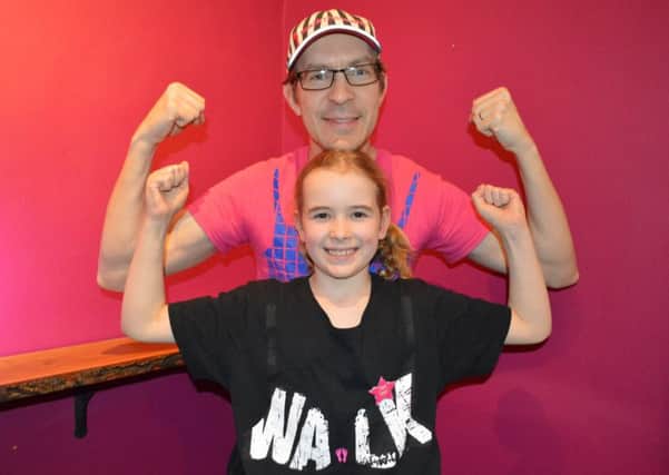 Alain Leger, from Cupar, Fife, with his daughter Julie, 9. Picture: Scott Louden