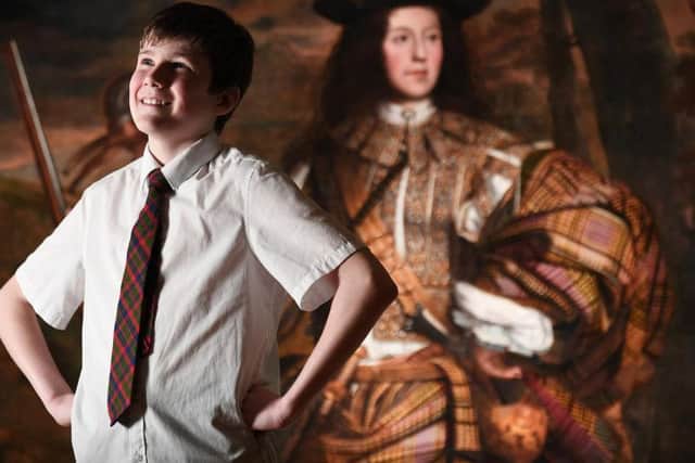 Thirteen-year-old Calum Murray from Glasgow Gaelic School helped until the portrait of Lord Mungo Murray at Kelvingrove Art Gallery and Museum.