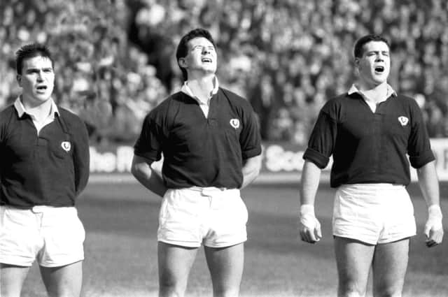 Iwan Tukalo, Sean Lineen and Scott Hastings sing Flower of Scotland before the 1990 Calcutta Cup match at Murrayfield. Picture: Alan Macdonald