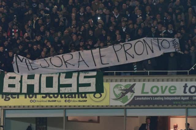 Celtic fans unveil a banner aimed at Rangers striker Alfredo Morelos