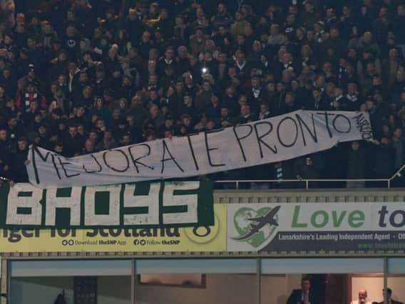 Celtic fans unveil a banner aimed at Rangers striker Alfredo Morelos