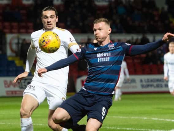Billy Mckay netted one in each half to seal victory for Ross County
