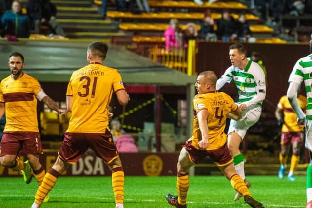 Odsonne Edouard looks on as Callum McGregor fires in Celtic's fourth